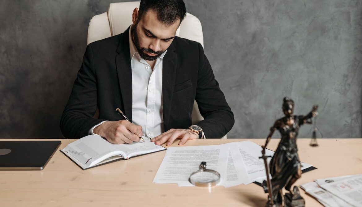 an attorney evaluating client documents in preparation to file a claim