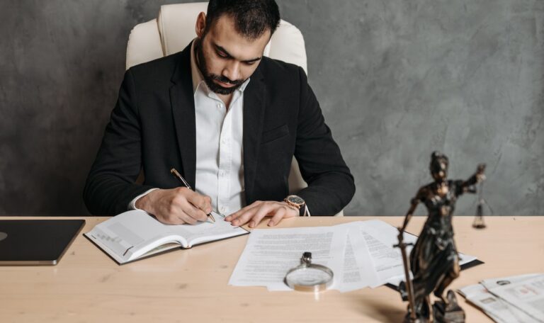 an attorney evaluating client documents in preparation to file a claim