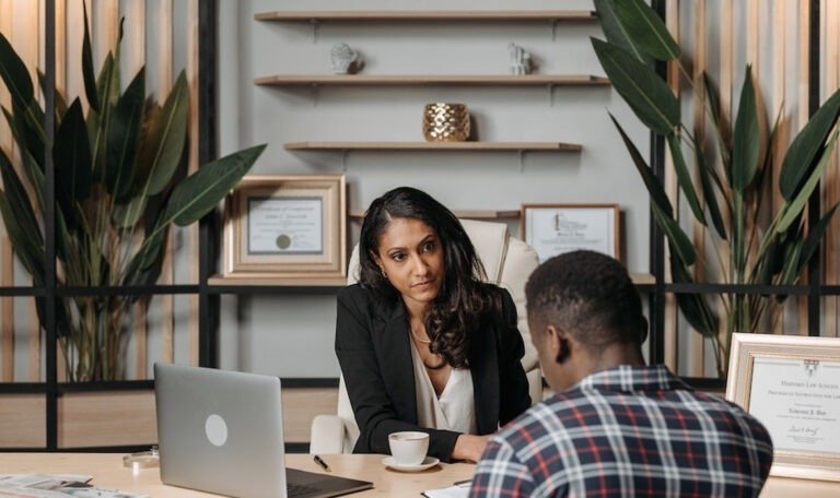 a wrongful death lawyer during consultation meeting with a client