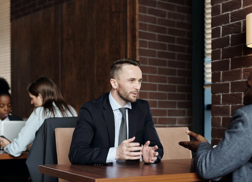 an attorney discussing with a client