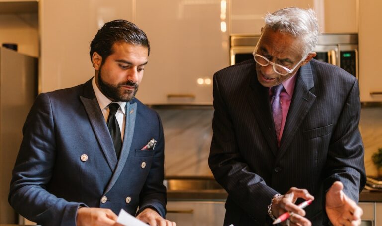 An wrongful death attorney explaining a document to a colleague